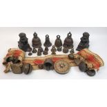 A group of Tibetan bronze bells in various sizes from 5cm to 15cm and a pair of bronze Buddhistic