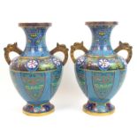 A good pair of Chinese cloisonne two-handled baluster vases the key pattern rims above taotie