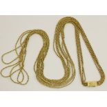 An 18ct four strand chain necklace the clasp signed Wellendorff, length approx 83cm, weight 49.3gms