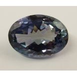 A loose oval mixed cut tanzanite with full Anchor Certificate report. Weight 9.44cts, measurements