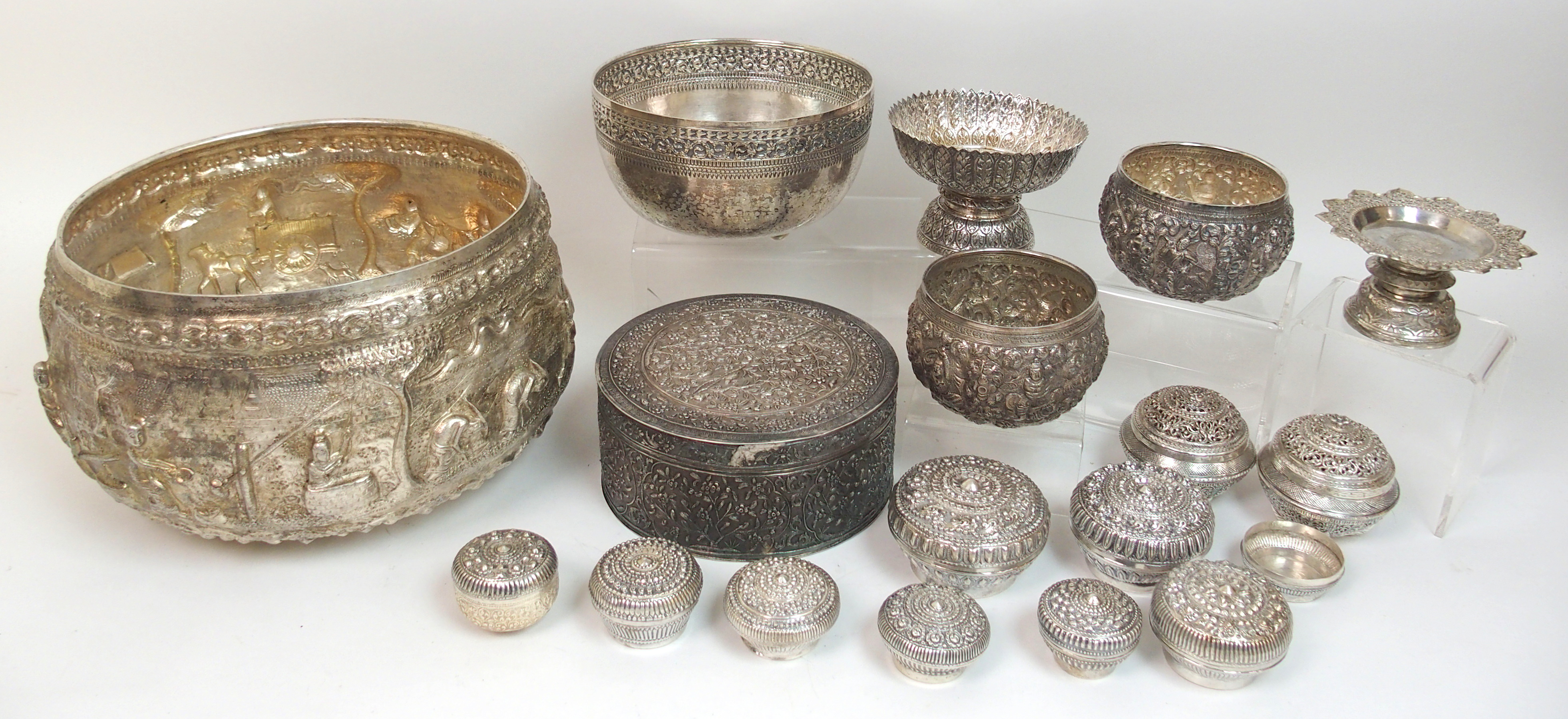 A group of Indian white metal wares comprising; circular box, 17.5cm diameter, 18oz, two bowls, 10cm