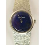 A 9ct ladies Buche Girod watch with a lapis lazuli dial in white gold with a woven textured strap,