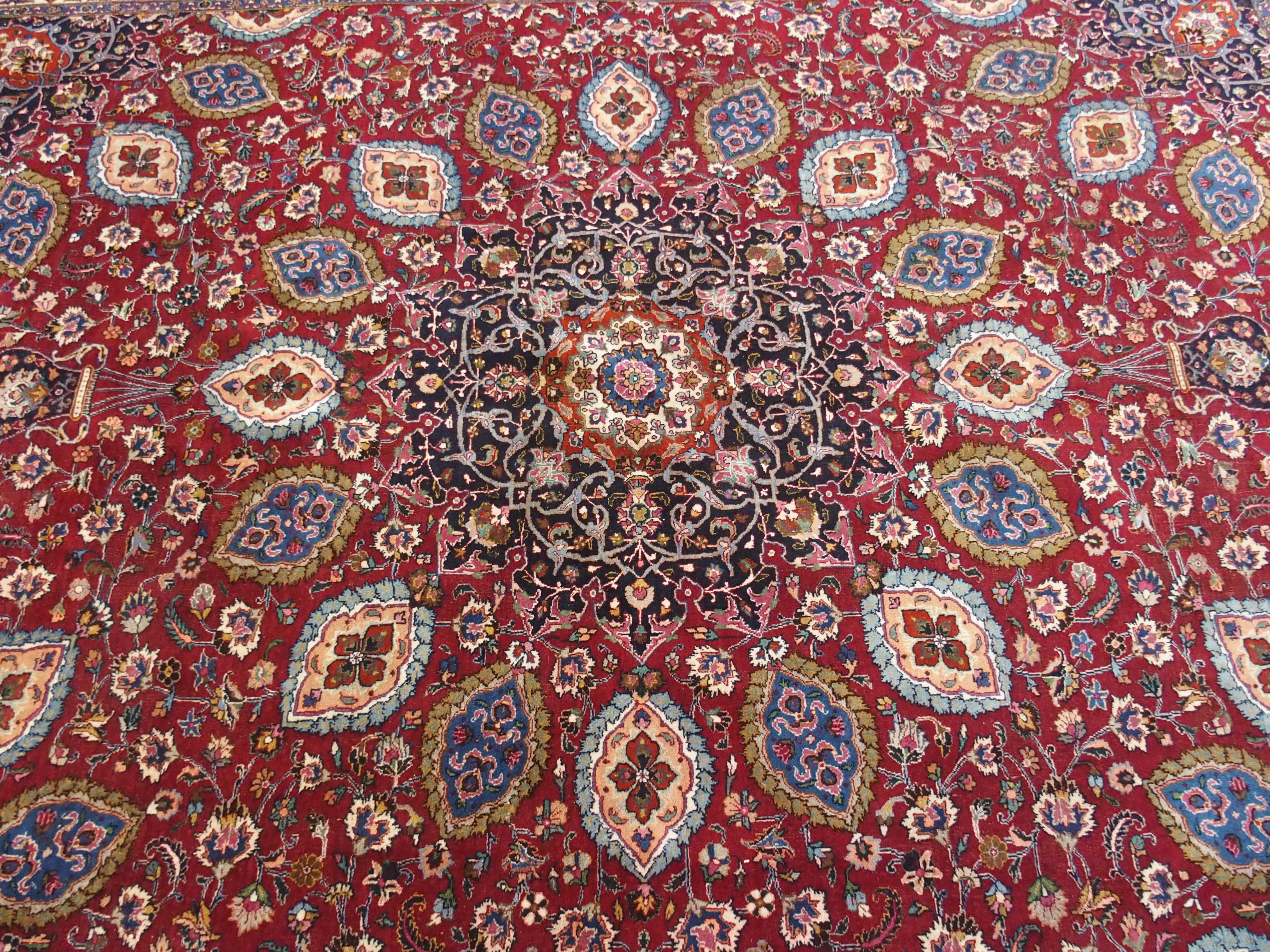 A red ground meshed rug with a blue central medallion and border, 370 x 294cm - Image 5 of 10