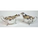 A pair of silver sauceboats by Viner's Limited (Emile Viner), Sheffield 1938, with scalloped rims