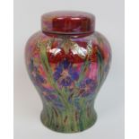 *An Anita Harris Art Pottery 'Iris Lustre' ginger jar hand painted by Anita Harris, the lustrous