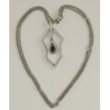 An 18ct white gold sapphire and diamond necklace designed and made by Lunn's of Belfast to