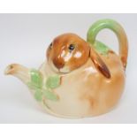 A rare Royal Doulton Bunnykins teapot the lid modelled as a rabbit's head, printed Bunnykins Royal