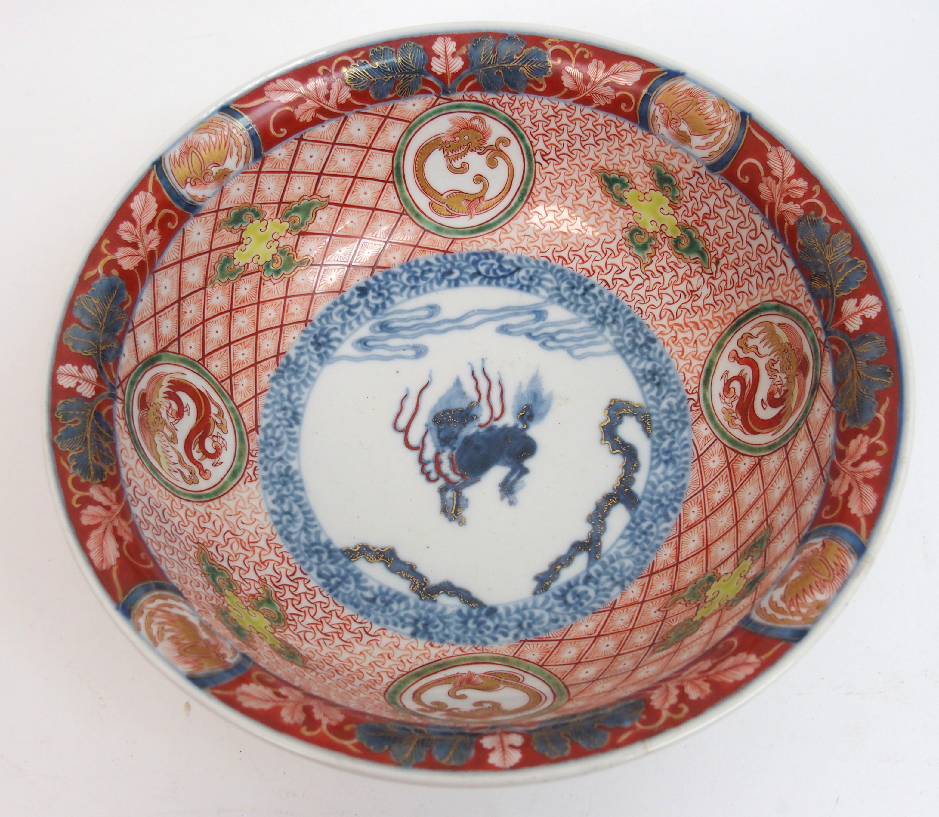 An Imari bowl painted with a kylin surrounded by gilt dragon roundels, diaper, trellis and cloud - Image 6 of 10