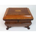 A burr walnut and satinwood cross banded two division tea caddy the hinged-shaped lid with inlaid