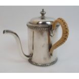 A silver Argyle (gravy pot) by Martin Hall & Company Limited, Sheffield 1922, of plain cylindrical