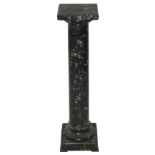 A 19th Century marble column pedestal the square rotating top above a square base on metal feet,