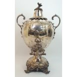 A 19th Century silver plated samovar no maker's marks, the tapering spherical body with foliate