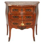 A Louis XV style rosewood serpentine shaped commode the marble top above three drawers, foliate