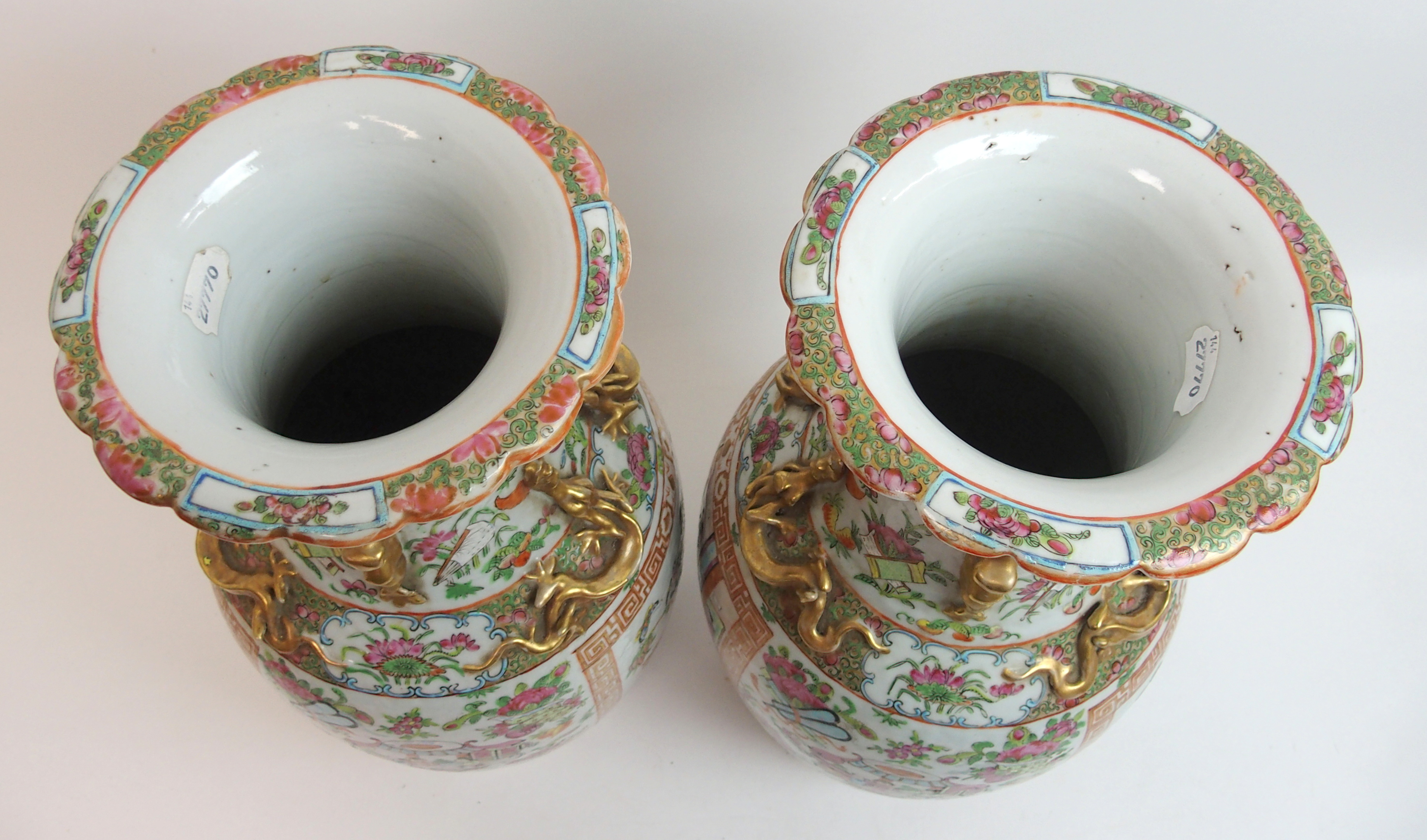 A pair of Canton famille rose baluster vases panted with large panels of mandarins holding court - Image 8 of 10