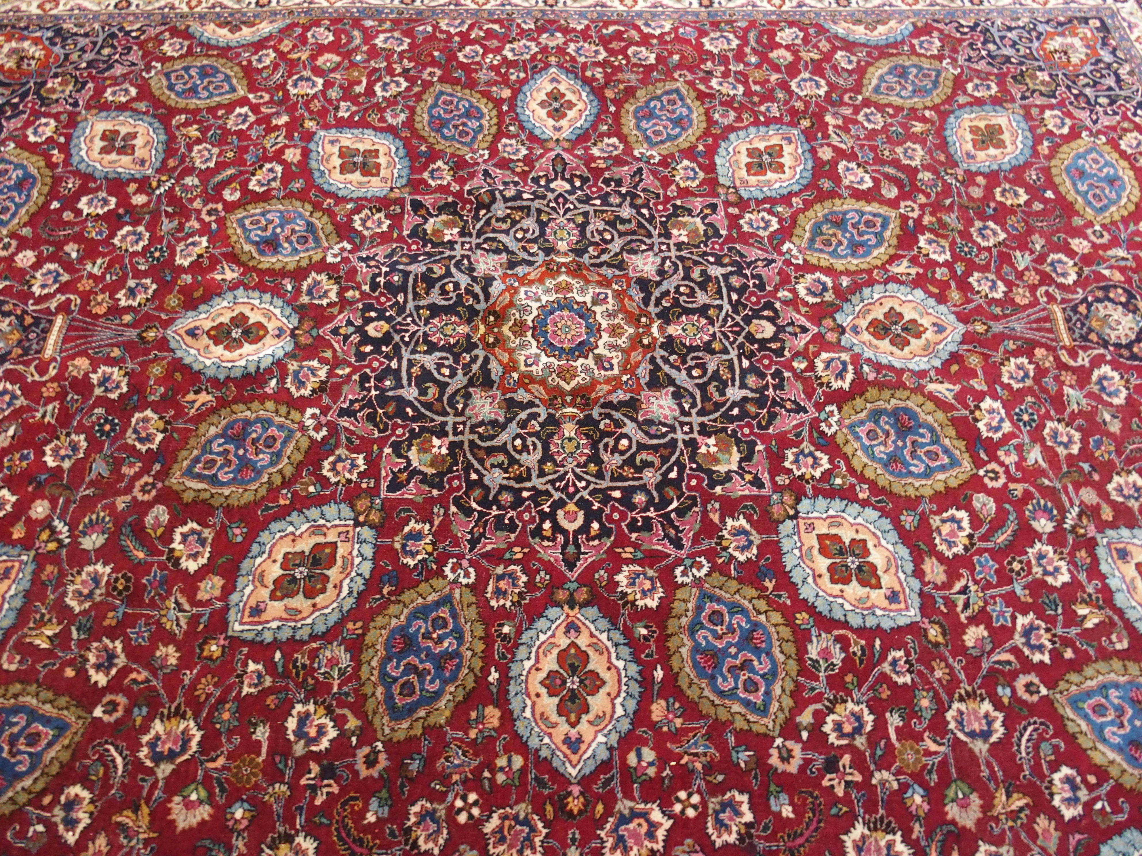 A red ground meshed rug with a blue central medallion and border, 370 x 294cm - Image 6 of 10