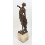 A French bronze figure of a lady signed G Moerlin classical lady in flowing dress carved ivory roses