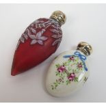 A Thomas Webb style pink cameo glass scent flask of teardrop form with flowers and foliage and