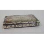 An early 19th Century continental white metal box unmarked, modelled as a book, the hinged cover and