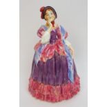 A Royal Doulton figure Quality Street the figure in crinoline dress in shades of pink and purple,