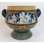 A Mettlach pottery pate-sur-pate Art Nouveau jardiniere the twin handled jardiniere decorated with