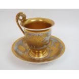 A 19th century Russian Gardner porcelain cup and saucer circa 1820, decorated in gilt with