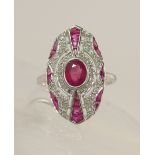 A 14ct ruby and diamond Art Deco style ring of pierced design set with a central ruby of approx