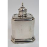 A silver tea caddy by George Unite & Sons, Birmingham 1926, of rectangular form with canted