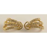 A pair of 14ct gold diamond spray earrings approx diamond content 0.70cts, the interior stamped