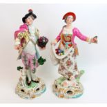 A pair of continental porcelain figures modelled as a lady and gentleman attired in 18th Century
