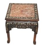 A Chinese hardwood square shaped pedestal inset allover with mother of pearl, marble inset top above