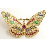 An exquisite gemstone set butterfly brooch set with white and yellow diamonds to an approximate