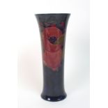 A William Moorcroft Pomegranate pattern vase the tall cylindrical body with slightly flaring rim