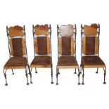 A set of four Paul Hodgkiss chairs burrwood, upholstered backs and seats, with wrought steel frames,