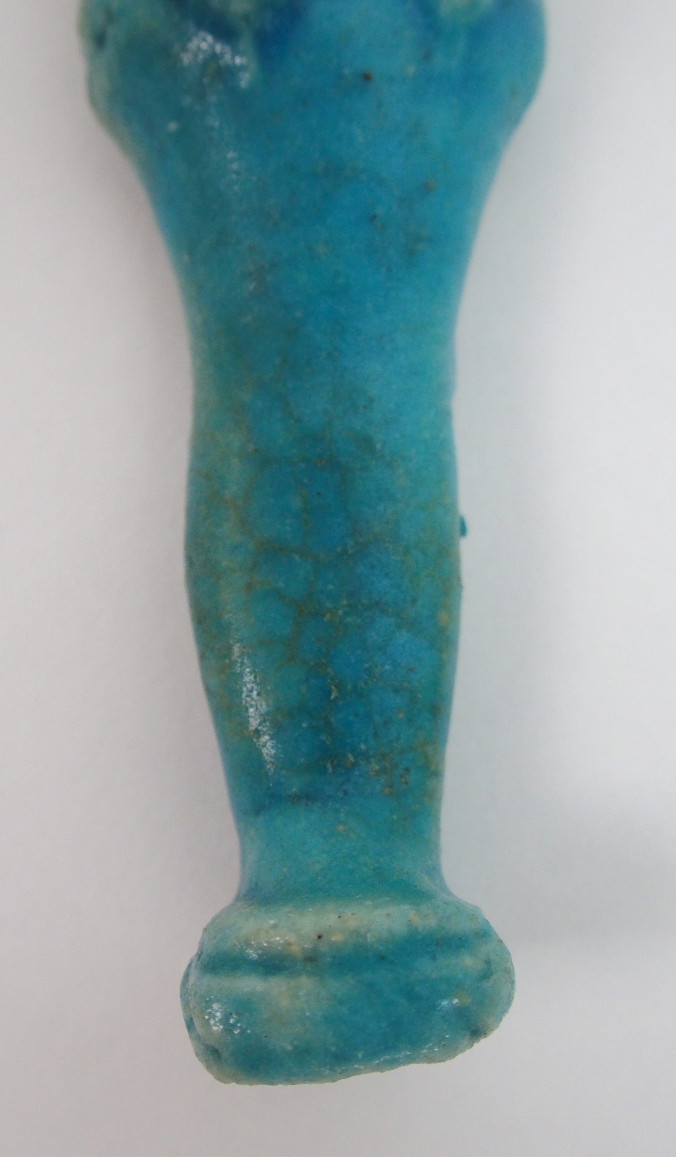 An Egyptian blue glazed ushabti figure holding fly whisks, unnamed, 10cm high - Image 10 of 10