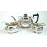 A three piece silver tea service by George Nathan and Ridley Hayes, Chester 1902, of rounded