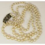 A double string of pearls with a silver clasp, length of shortest string 44cm