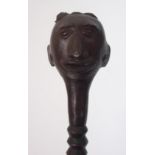 *WITHDRAWN* A West African bronze and iron ceremonial staff cast with a head set with curling locks