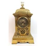 A 19th Century pierced brass mantle clock of rectangular base, the decoration of pierced foliate