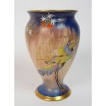 A Carlton Ware Sketching Bird pattern vase decorated with a brightly coloured exotic bird and