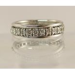 A French 18ct white gold full eternity ring set with approximately 0.80cts, finger size N1/2, French