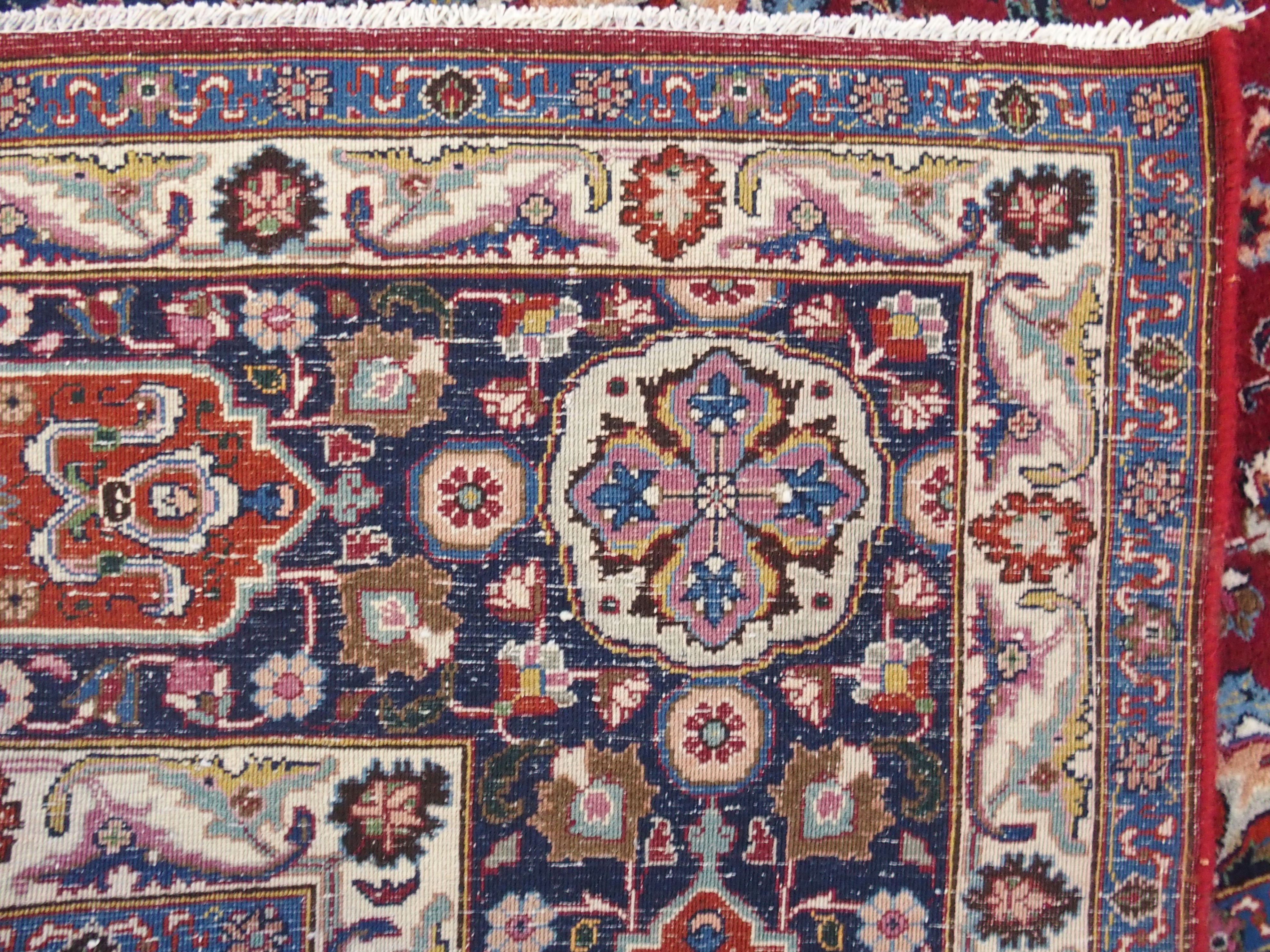 A red ground meshed rug with a blue central medallion and border, 370 x 294cm - Image 10 of 10