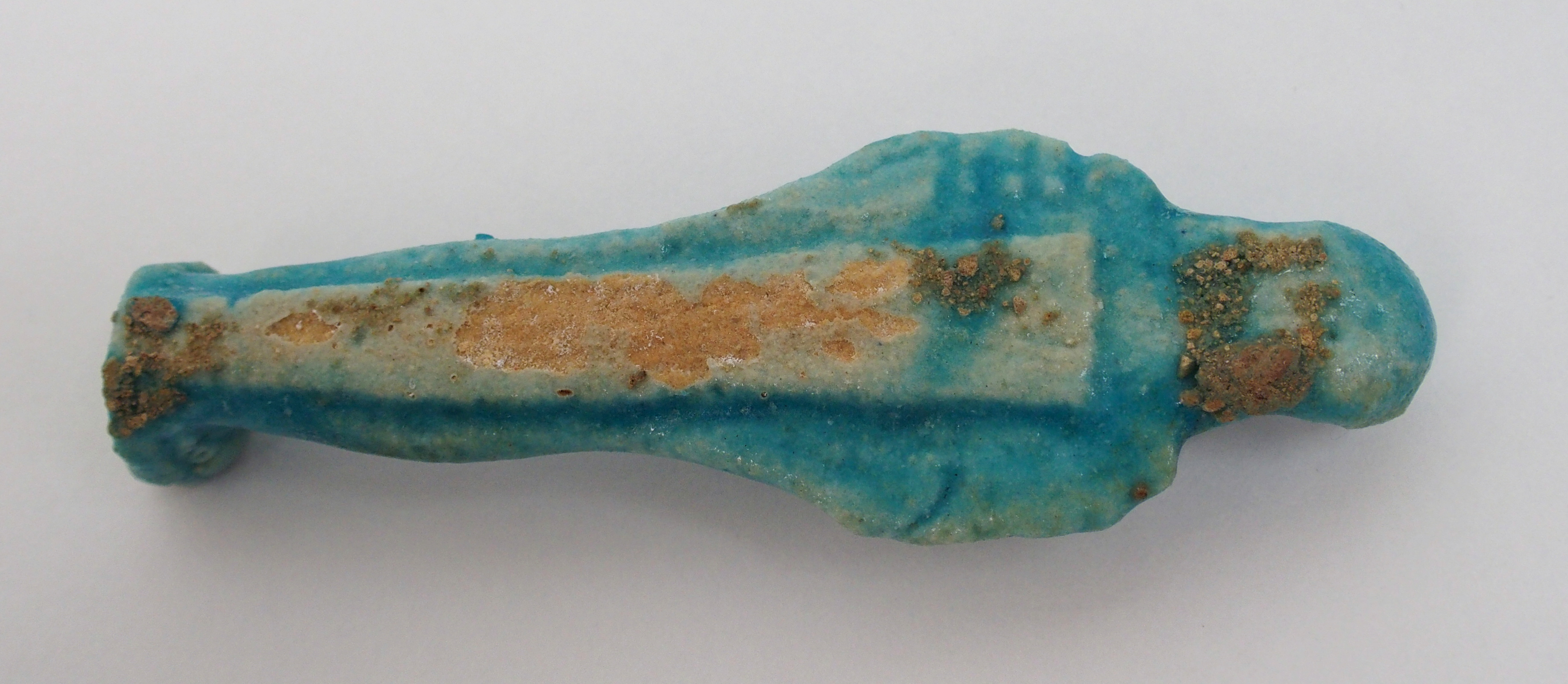 An Egyptian blue glazed ushabti figure holding fly whisks, unnamed, 10cm high - Image 6 of 10