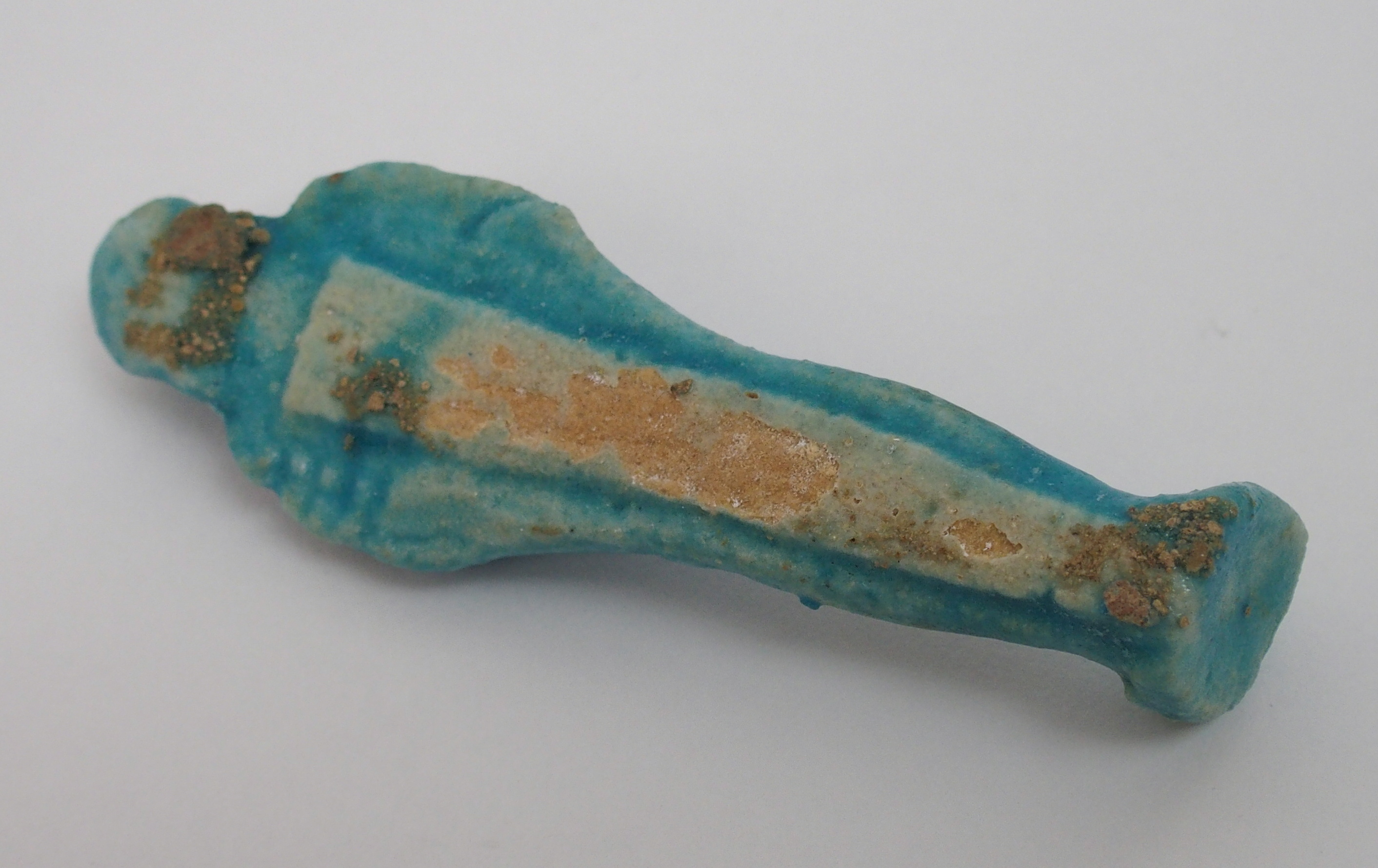 An Egyptian blue glazed ushabti figure holding fly whisks, unnamed, 10cm high - Image 9 of 10