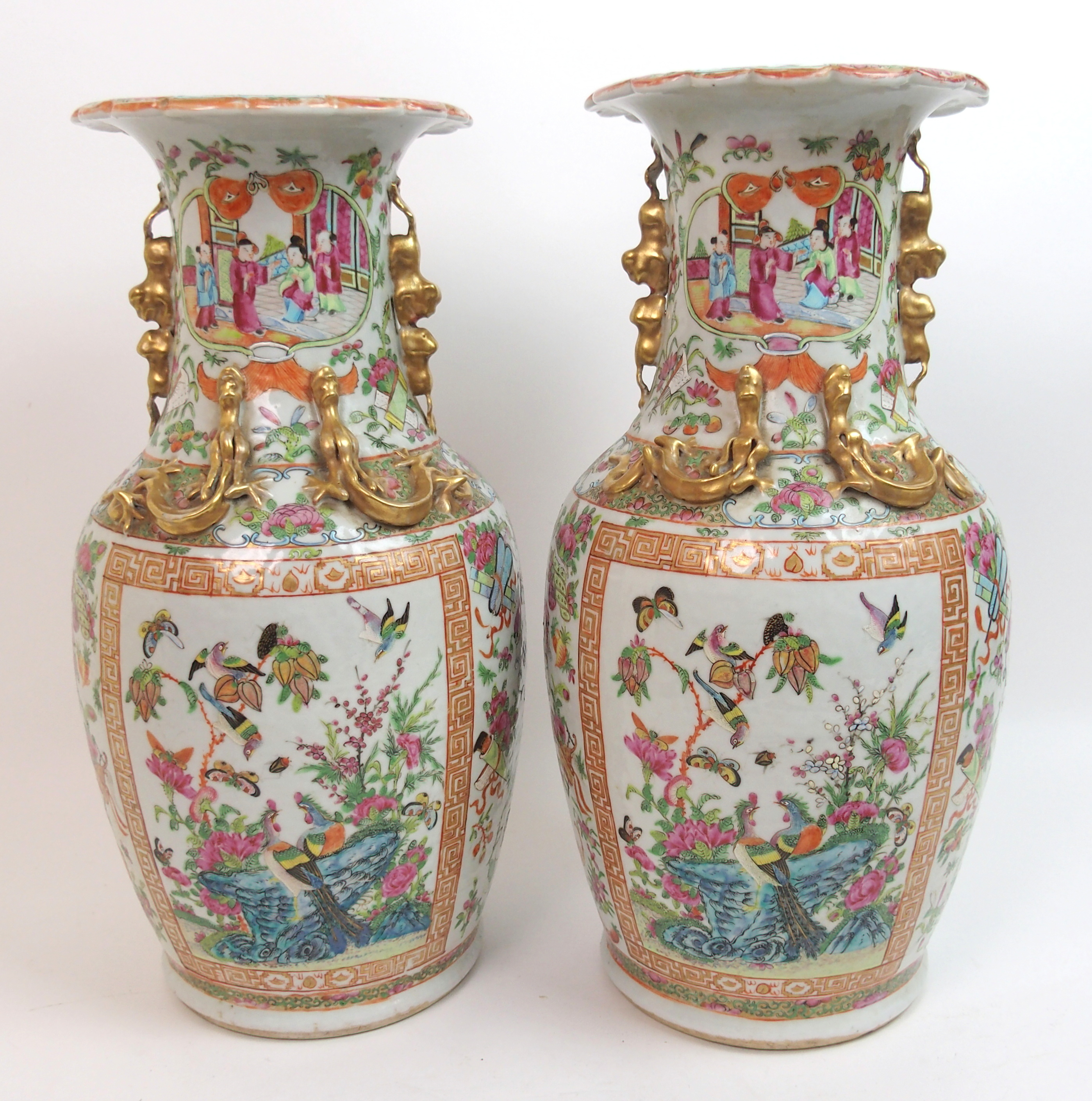 A pair of Canton famille rose baluster vases panted with large panels of mandarins holding court - Image 3 of 10