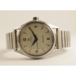 A gent's stainless steel Omega SeaMaster Automatic with cream coloured dial silver coloured chevron,