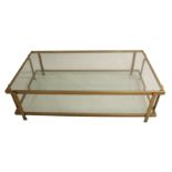 A 1970's 23ct gold plated coffee table with two glass shelves, possibly by Maison Jansen, 37cm