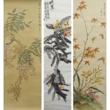 Three Chinese scroll paintings decorated with butterflies and foliage, 91 x 30cm, another with