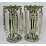 A pair of Victorian bohemian glass lustres the green bodies overlaid in white, facet cut,
