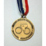 A yellow-metal British National Championship gold medal the obverse inscribed British Cycling