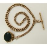 A 9ct gold curb link fob chain with 9ct gold mounted double sided agate fob seal, hallmarked to